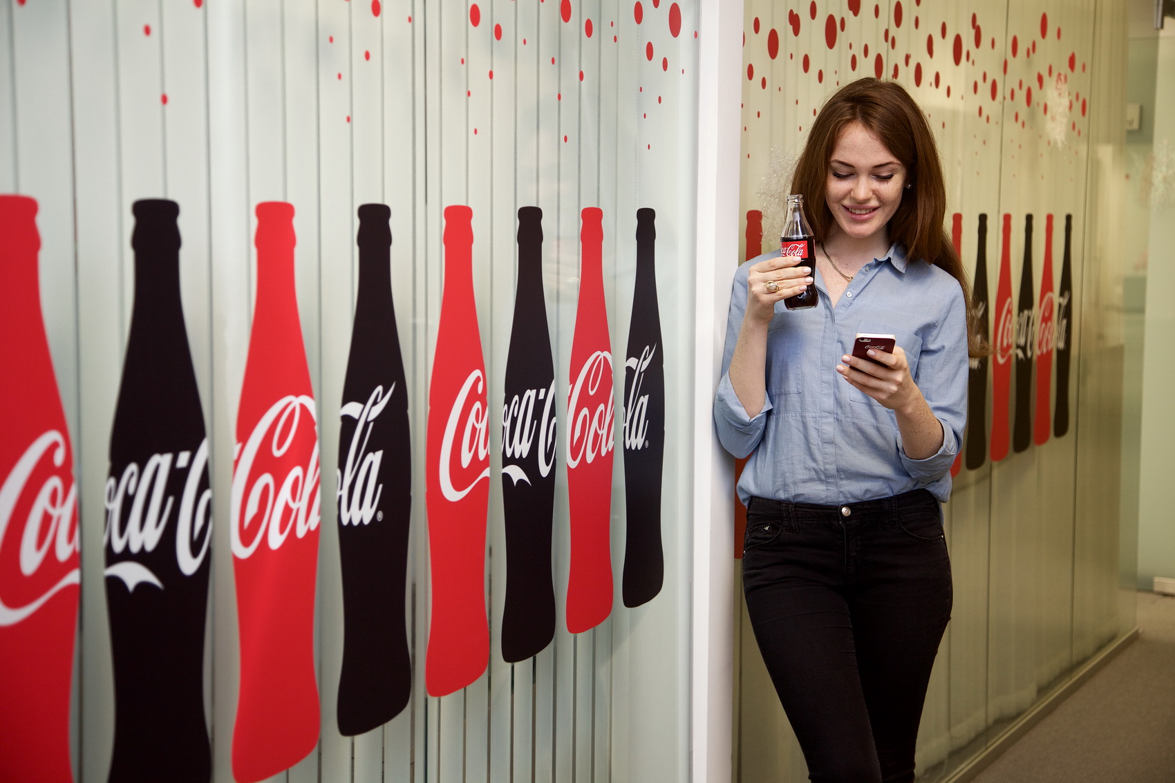 Айдентика компании Coca Cola